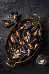 Boiled mussels, shot from above in a pan