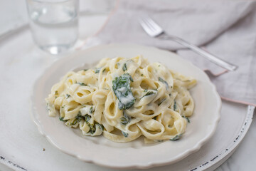 tagliatelle pasta with a creamy wild garlic sauce