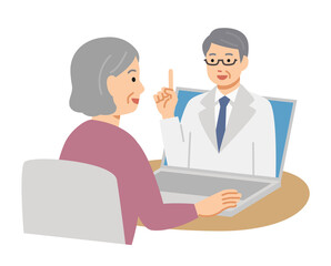 パソコンでオンライン診療を受ける笑顔のシニア女性