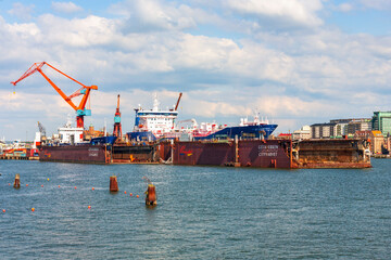 Fototapeta na wymiar Shipyard in Gothenburg with ships in dry dock
