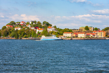 Fototapeta na wymiar Archipelago environment with a passenger boat in Gothenburg