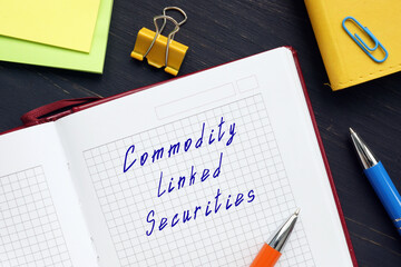  Financial concept about Commodity Linked Securities with inscription on the sheet.