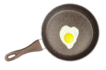 fried egg in a non-stick frying pan isolated on white