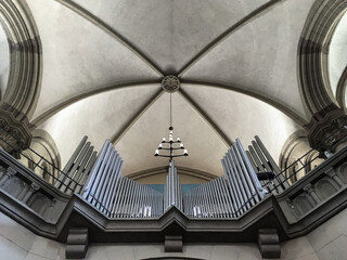 Clean minimalist Gothic interior style architecture inside Roman Catholic church or cathedral with...