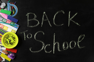 School supplies and office on blackboard background, Back to school concept