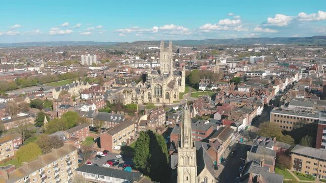 Aerial drone shot of Gloucester Cathedral and city, England