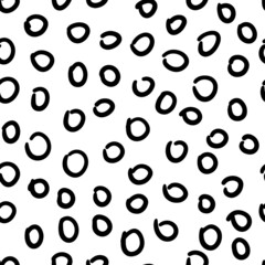 Seamless round cakes bagels doodle vector hand painted pattern. Abstraction of brush strokes. Black and white, you can set any background. Suitable for wallpaper, textiles, covers and other finishing 