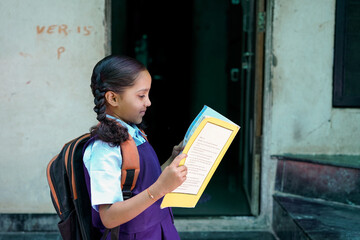 Indian school girl wearing school uniform