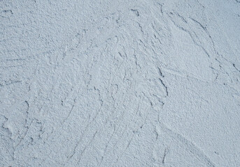 Decorative plaster. Grey wall texture background. Concrete style. Restoration indoors. Maintenance works. Renovation at home.