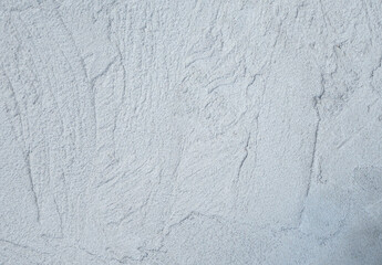 Decorative plaster. Grey wall texture background. Concrete style. Restoration indoors. Maintenance works. Renovation at home.