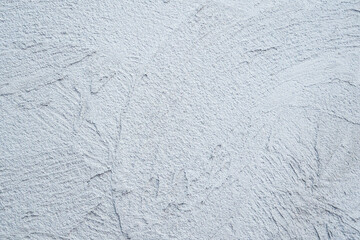 Decorative plaster. Grey wall texture background. Concrete style. Restoration indoors. Maintenance works. Renovation at home.