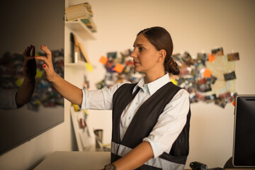 FBI woman in office. Detective typing on screen touch.