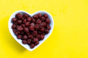 Star gooseberry in syrup in heart shape bowl