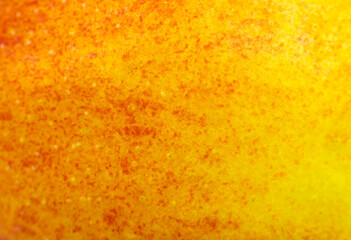 Close up photo of red apple background. Apples fruit peel texture, macro view. Beautiful natural wallpaper.