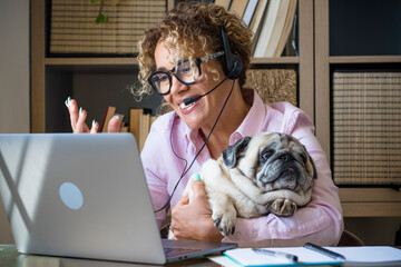 Home smart working people job business activity - cheerful young woman use zoom video call and...