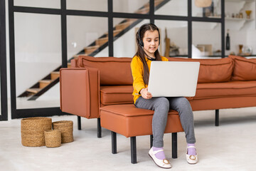 Little Girl Using Digital Laptop E-learning Concept