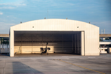 Aircrafts parking inside the hangar in airport