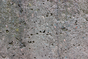 Gray concrete texture. Grainy concrete wall surface.