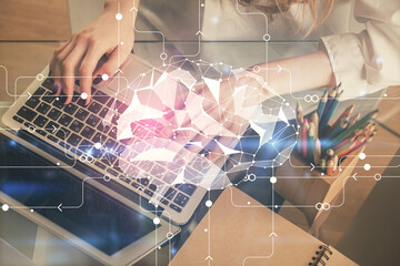 Double exposure of woman hands working on computer and brain hologram drawing. Ai concept.