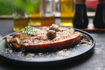 Baked eggplant steak with Brussels sprouts.
Culinary photography. Suggestion to serve the dish.