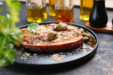Baked eggplant steak with Brussels sprouts.
Culinary photography. Suggestion to serve the dish.