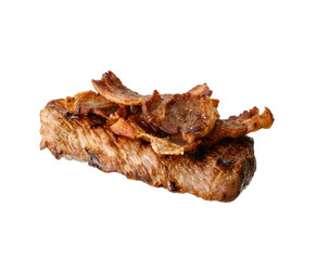 fried piece of beef with pieces of fried bacon isolated on white background