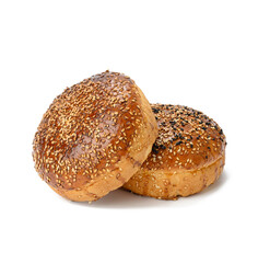 two baked sesame seed buns isolated on white background, hamburger bread