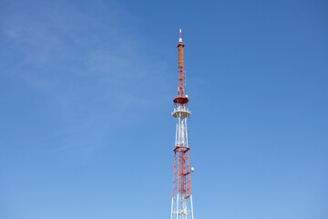 TV Tower against A Blue Sky. Concept TV, Broadcast, Communications, Information, News
