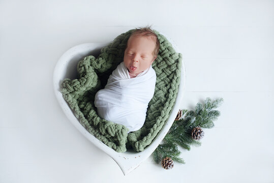 the newborn yawns,. Portrait of a newborn baby  . High quality photo