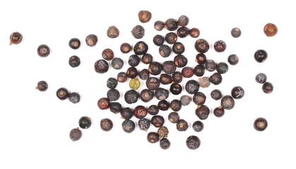 Dried juniper berries pile isolated on white background, top view