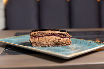 Chocolate raspberry jam cake served on a plate