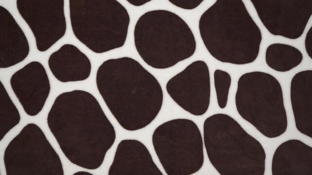 Animal print seamless pattern design with irregular ink black spots on white background. Fabric with a pattern of the skin of a Dalmatian dog, leopard, cow