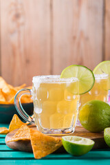 Mexican alcohol cocktail chelada with light beer and lime juice