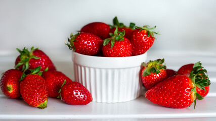 Sweet red strawberries on white background