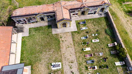 Christian cemetery in the countryside hills Italy