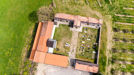Christian cemetery in the countryside hills Italy