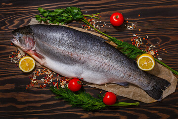 Large, fresh trout and vegetables