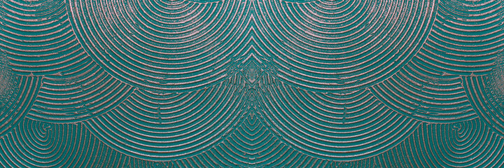 Wall with abstract circles. Metallic luster. Color - Blue Stone, Hue Green. The concept of a fantastic pattern for a backdrop.