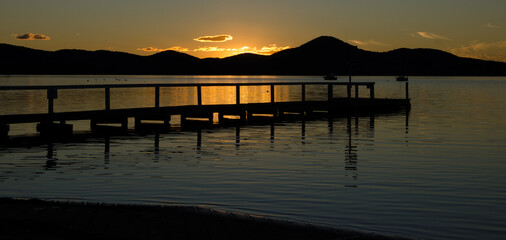 Jetty silhouette at sunset 