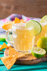 Mexican alcohol cocktail chelada with light beer and lime juice