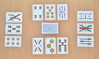 truco cards game set on wooden plank ,Spanish card game CARTAS ESPENOLAS, Gambling, Casino, Concept background