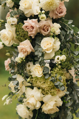 Wedding decor with flowers. Beautiful arch for the registration of the newlyweds.