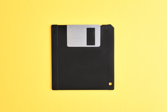 Floppy disk on yellow background