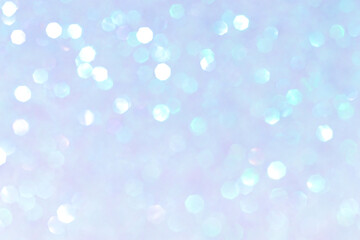 Obraz premium Shiny blurred blue background with bokeh for a festive mood. Greeting card template for fun.