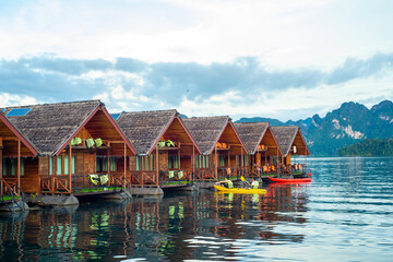Fototapeta premium floating house at Cheow Lan Dam (Ratchaprapa Dam), Thailand. One of unseen Thailand for tourist destination