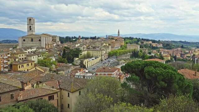 Cityscape of the city of Perugia. Above the roofs stand the bell towers of the convent of San Domenico and the church of San Pietro. Perugia, Umbria