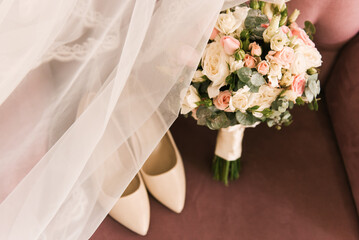 Wedding bouquet of the bride on a pink background
