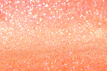 Shiny blurred yellow background with bokeh for a festive mood. Greeting card template for fun.