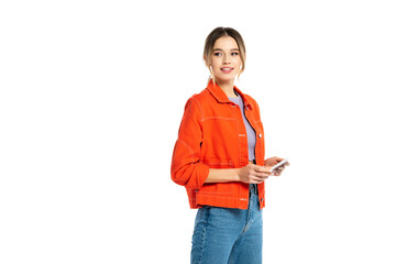 cheerful young woman in orange shirt using smartphone isolated on white - Powered by Adobe