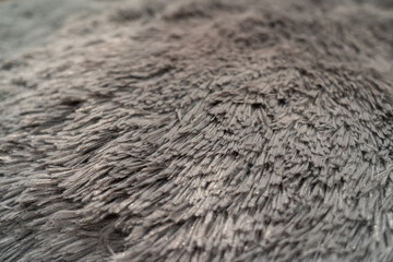 Close-up view of artificial fur. Artifical fur texture may be used as background.